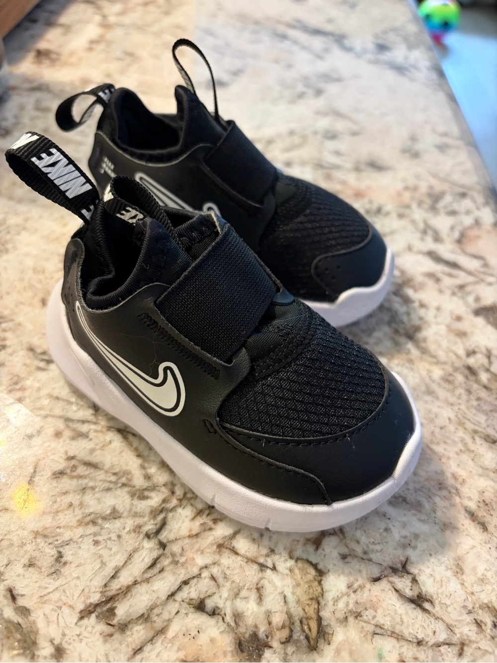 Nike Black and White Kids Slip-On Sneakers
